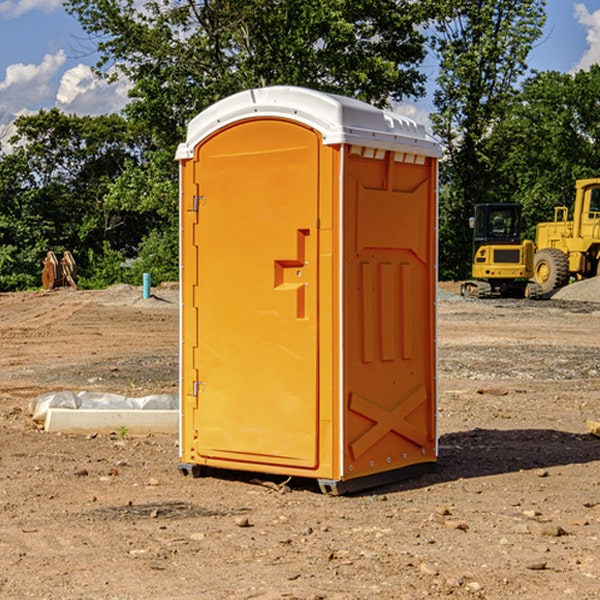 how often are the portable restrooms cleaned and serviced during a rental period in Ferrysburg